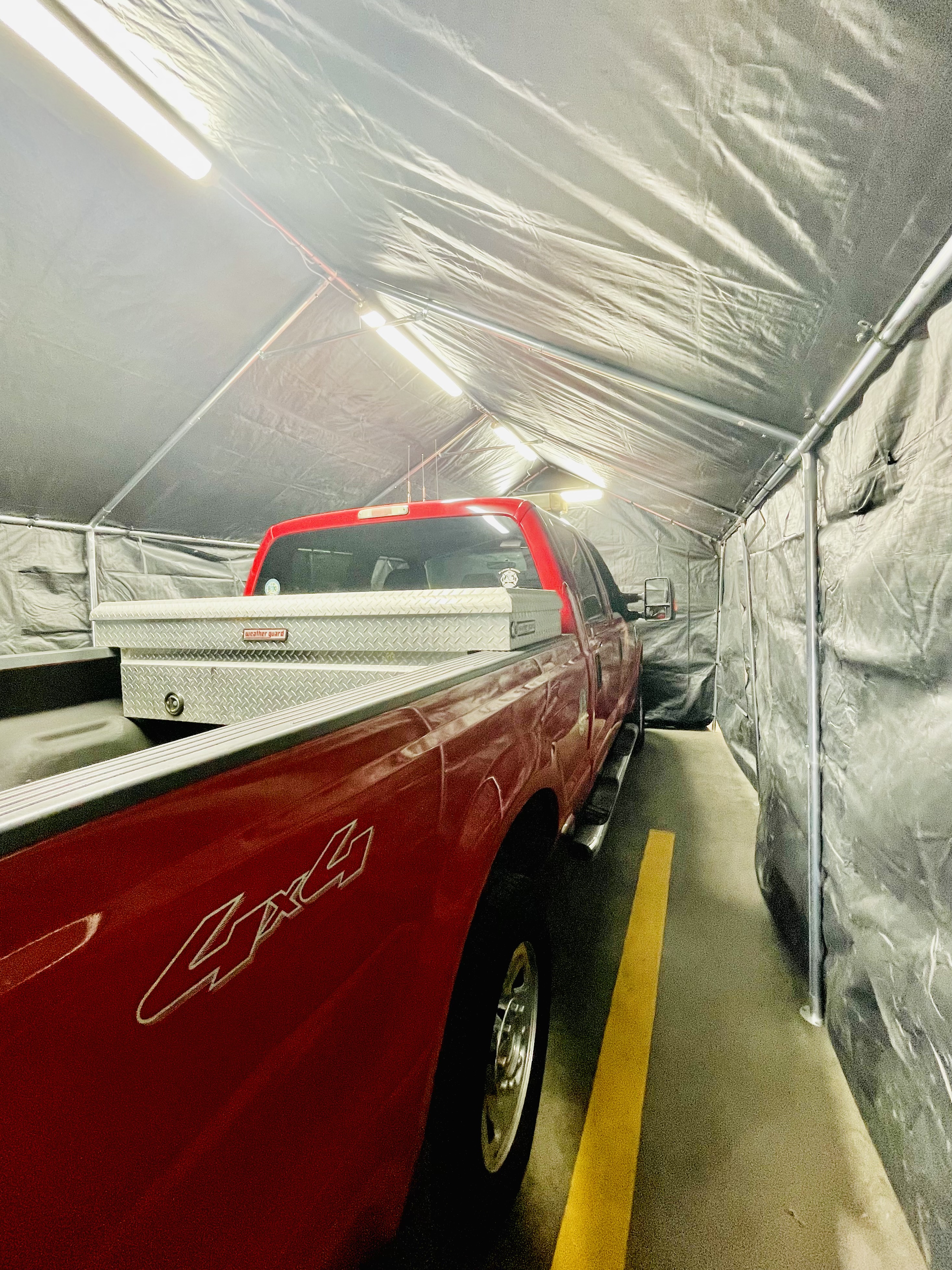 Support truck inside the paint booth