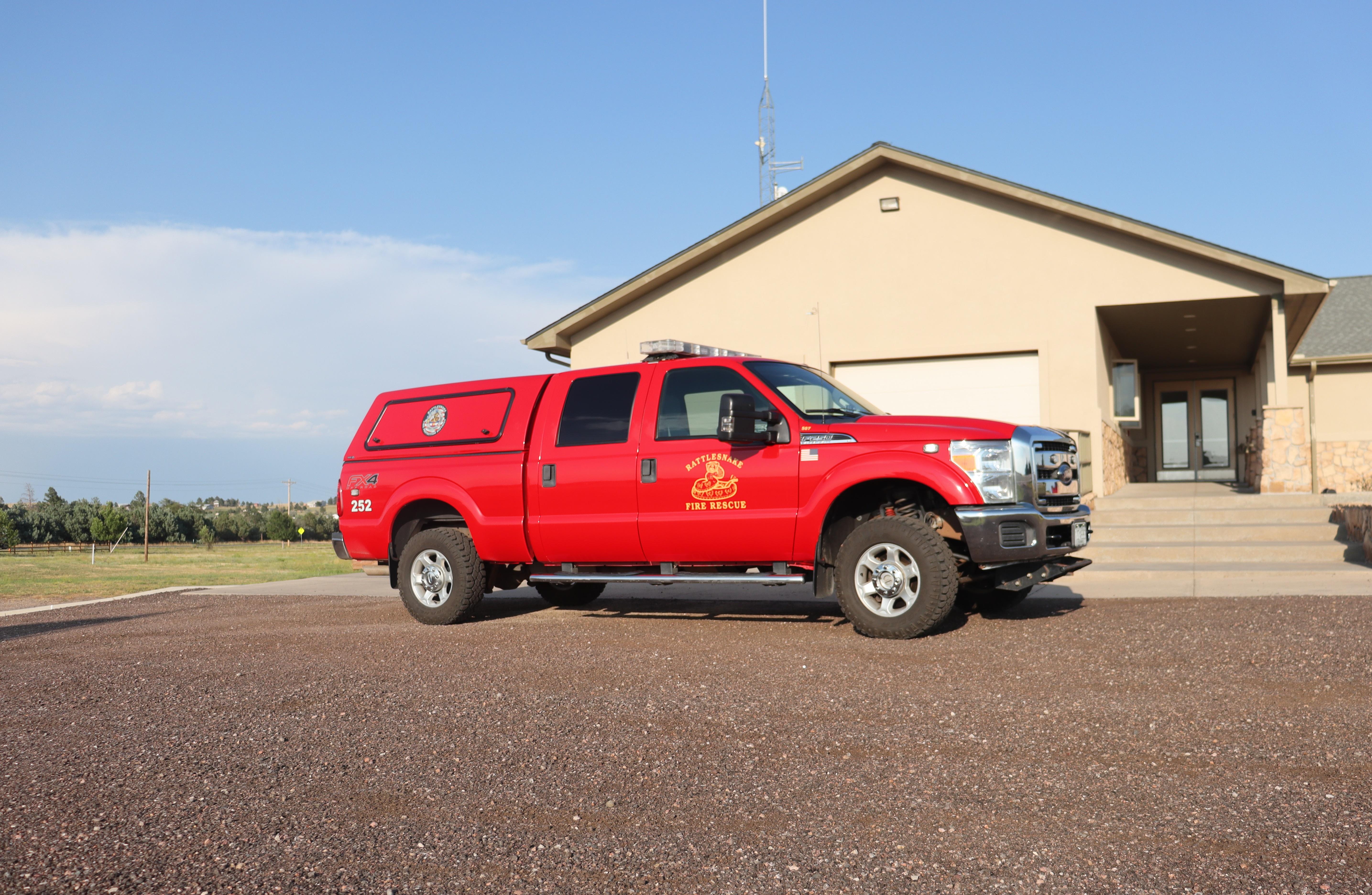 Command Truck 252 parked in front of the Administration Building