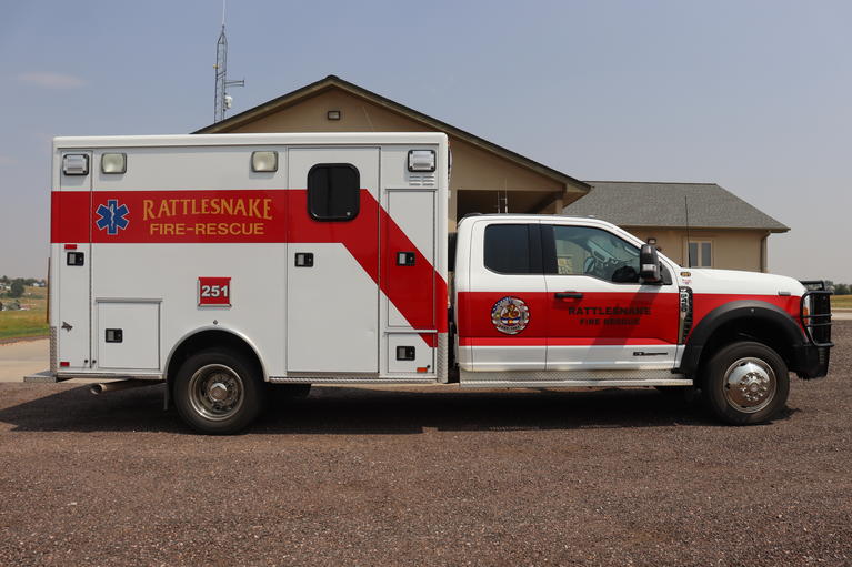 Medic 251 parked in front of the Training Center - Administration Building